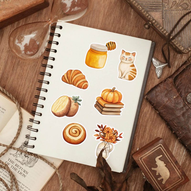 naklejki jesienne dla jesieniary, naklejka kot, miód, croissant, ziemniak, dynia, książki, cynamonka i kwiaty